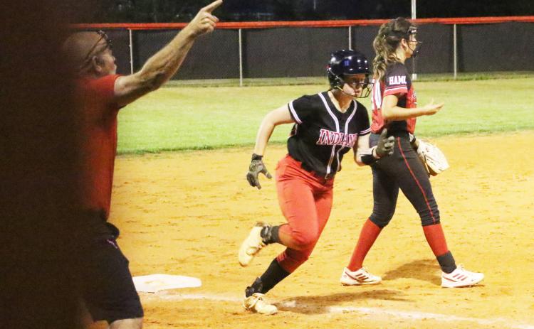 Fort White’s Hannah LeBleu turns off of third base toward home plate to score a run against Hamilton County on Thursday. (MORGAN MCMULLEN/Lake City Reporter)
