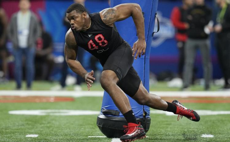 Georgia defensive lineman Travon Walker runs a drill during the NFL scouting combine on March 5 in Indianapolis. (AP File)