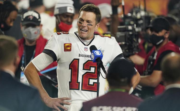 Tampa Bay Buccaneers quarterback Tom Brady is interviewed on the field after winning Super Bowl 55 against the Kansas City Chiefs on Feb. 7, 2021, in Tampa. (AP File)