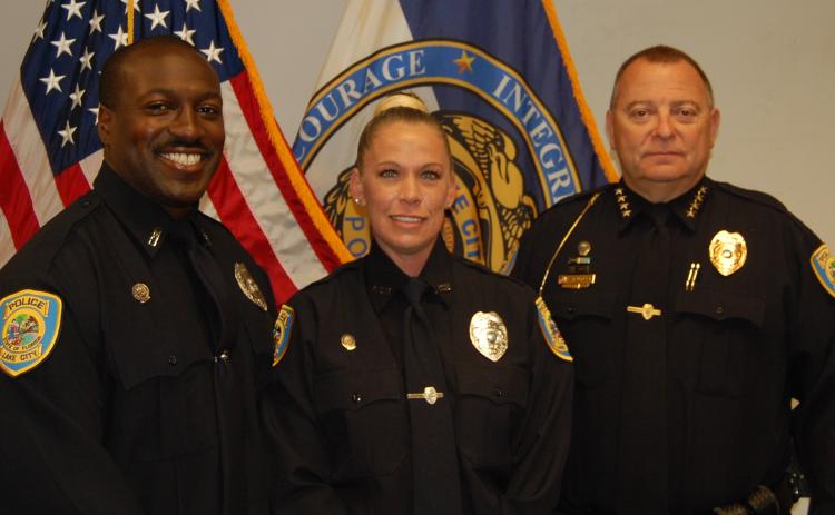 Lake City Police Chief Gerald Butler swore in new officers Amanda Pepin (center) and Donald Edouard (left) last week. (COURTESY)