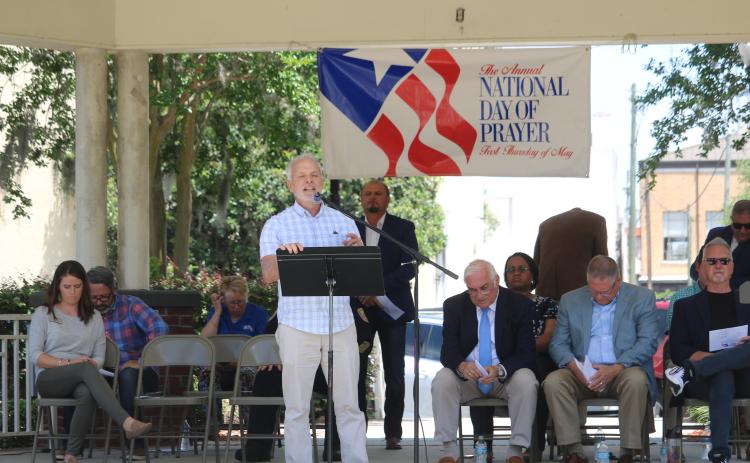Matt Glover, New Life Christian Fellowship pastor, prays during the National Day of Prayer event Thursday. (TONY BRITT/Lake City Reporter)