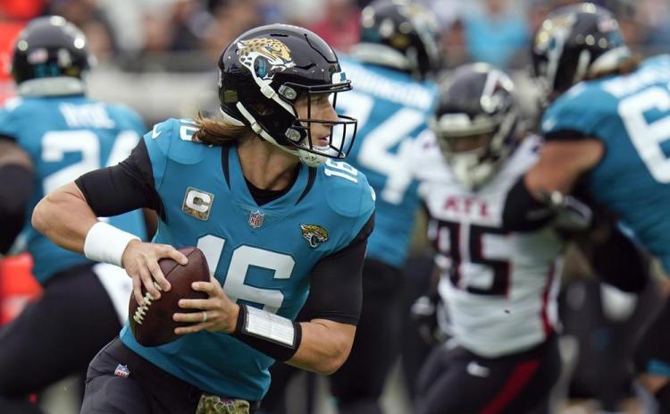 Jacksonville Jaguars quarterback Trevor Lawrence looks for a receiver against the Atlanta Falcons on Nov. 28, 2021, in Jacksonville. (AP FILE)