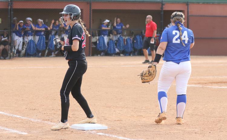 Fort White’s Maddy Keen celebrates on first base after hitting a single against Jay during the Class 1A state championship game at Legends Way Ballfields on Wednesday in Clermont. (MORGAN MCMULLEN/Lake City Reporter)