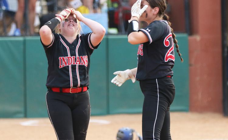 Fort White outfielder Gracie Clemons (left) reacts next to pitcher Kadence Compton after making the final out of the Class 1A state championship against Jay at Legend Way Ballfields on Wednesday in Clermont. The Royals won 6-5, holding on after the Indians loaded the bases with two outs in the seventh inning. (MORGAN MCMULLEN/Lake City Reporter)