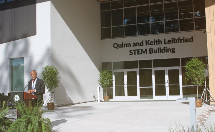 Keith Leibfried speaks during grand opening ceremony of the Quinn and Keith Leibfried STEM Building on the Florida Gateway College on Thursday. (TONY BRITT/Lake City Reporter)