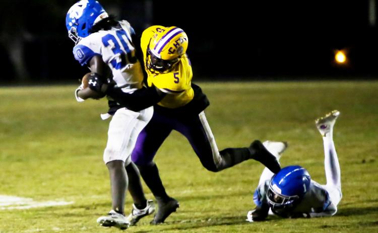 Columbia's Jaden Robinson makes a tackle against Riverside last season. (BRENT KUYKENDALL/Lake City Reporter)