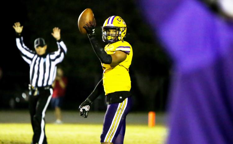 Columbia cornerback Amare Ferrell reacts after making an interception against Riverside during the Region 1-6A quarterfinals last season. (FILE)