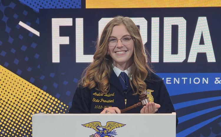 Anelise Bullard holds the gavel after being elected as the Florida FFA State President. (COURTESY)