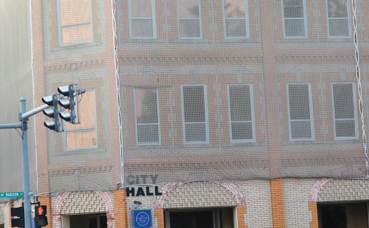 Despite structural deficiencies, which require netting around the building, the Lake City Council is interested in possibly renovating City Hall. (JAMIE WACHTER/Lake City Reporter)