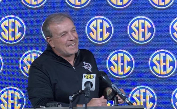 Texas A&M coach Jimbo Fisher speaks during the SEC spring meetings on Wednesday in Destin. (RALPH D. RUSSO/Associated Press)