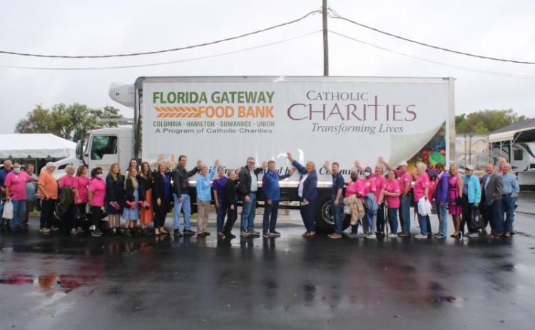 A file photo shows the Catholic Charities' food truck, which the organization acquired in February. Catholic Charities is now facing a food shortage in its efforts to help food insecure families. (FILE)
