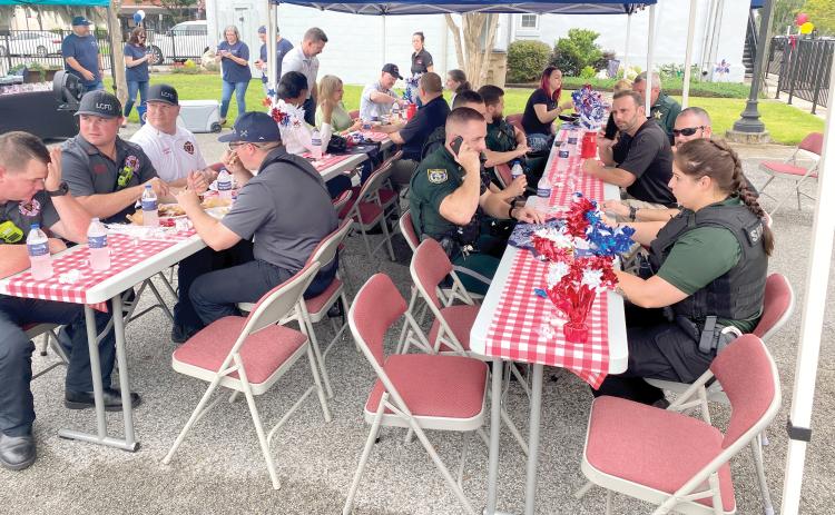 First responders from the Lake City Fire Department, Lake City Police Department and Columbia County Sheriff’s Office enjoyed the luncheon last July. (FILE)