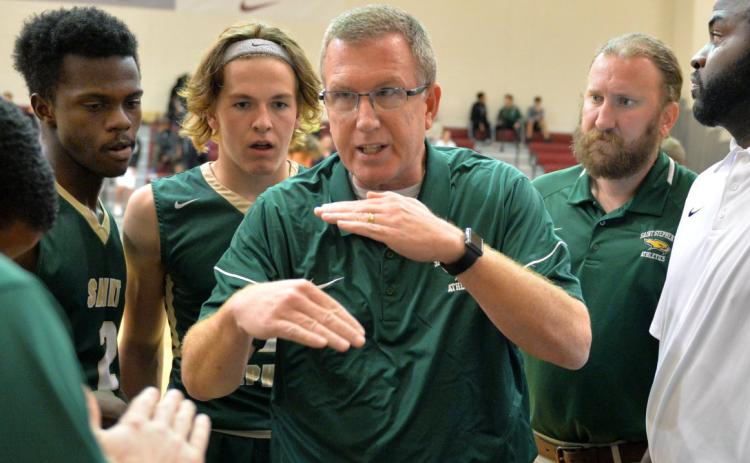 Dave Ruemenapp, pictured above during his time as Saint Stephen’s Episcopal’s boys basketball coach, brings most of his coaching experience to Columbia’s golf team from his time on the hardwood. (MIKE LANG/Herald-Tribune)