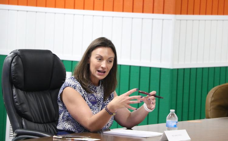 Nikki Fried, speaking at a Lake City event Saturday, is challenging federal law that bars medical-marijuana patients from purchasing firearms. (MORGAN MCMULLEN/Lake City Reporter)