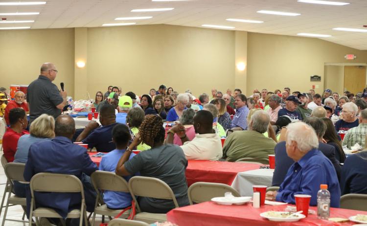 County Commissioner Rocky Ford speaks to the hundreds that attended Thursday’s Columbia County Republican Party rally at the Florida Gateway Fairgrounds banquet hall. (MORGAN MCMULLEN/Lake City Reporter)