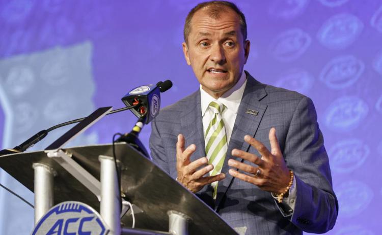 ACC commissioner Jim Phillips answers a question during ACC Media Days on Wednesday in Charlotte, N.C. (NELL REDMOND/Associated Press)