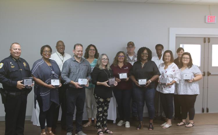 Employers involved with the CareerSource Florida Crown Summer Youth Employment Program pose with awards they received for participating in the program during the program’s banquet on Friday. (TONY BRITT/Lake City Reporter)