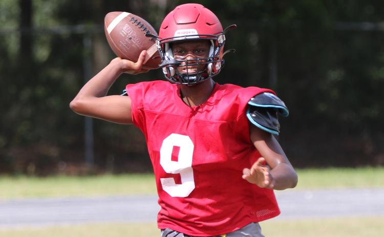 Lafayette quarterback Tywan Williamson throws a pass during practice on Aug. 3. (JAMIE WACHTER/Lake City Reporter)