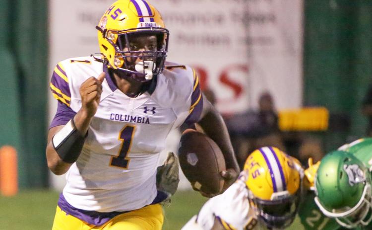 Columbia quarterback Tyler Jefferson carries the ball up the field during Friday’s Preseason Classic against Suwannee. (BRENT KUYKENDALL/Lake City Reporter)
