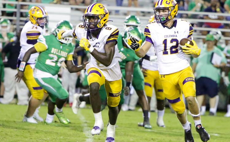 Columbia receiver Camdon Frier (12) rushes up the field as Jaylen Cooper runs to block during Friday’s Preseason Classic against Suwannee. (BRENT KUYKENDALL/Lake City Reporter)
