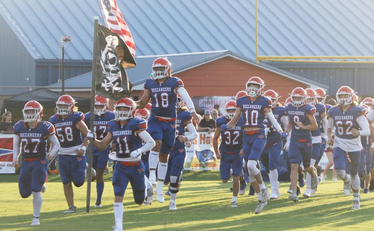Branford’s football team heads out on to the field for last Friday’s Preseason Classic against Fort White. (MORGAN MCMULLEN/Lake City Reporter)