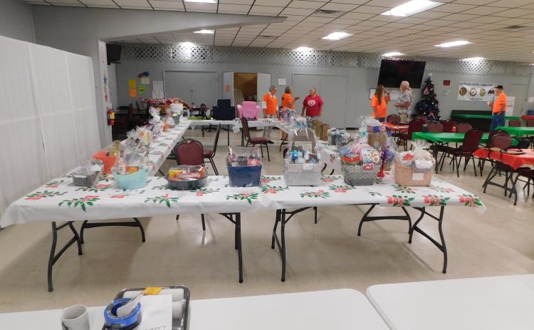 Baskets of donated goods sit in the halls of the American Legion Post 57 ahead of Saturday’s auction. (COURTESY)