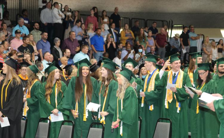 A group of Florida Gateway College graduates celebrate during the college’s graduation ceremony on May 6. (FILE)