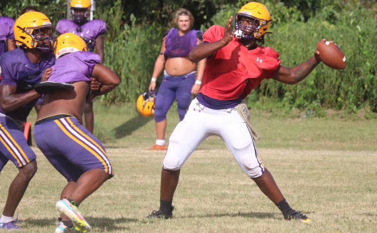 Columbia quarterback Tyler Jefferson throws a pass during practice on Aug. 12. (JORDAN KROEGER/Lake City Reporter)