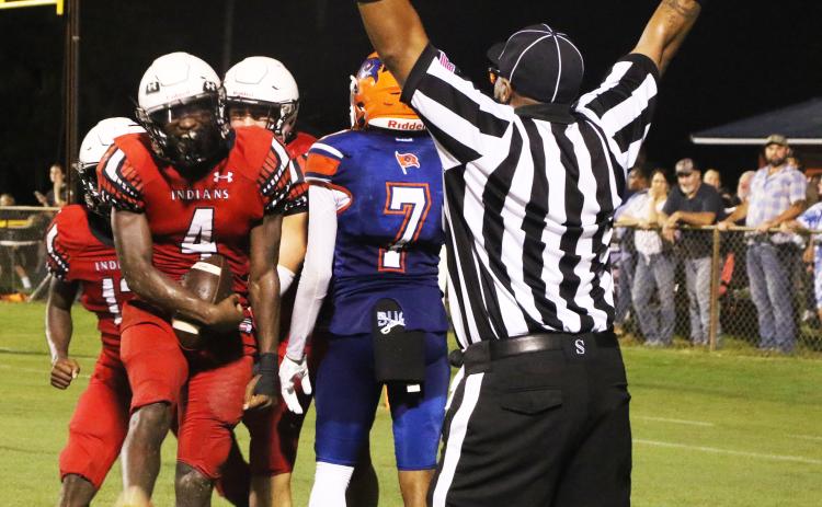 Fort White fullback Maliki Clark celebrates after scoring a touchdown against Branford during Friday's Preseason Classic. (MORGAN MCMULLEN/Lake City Reporter)
