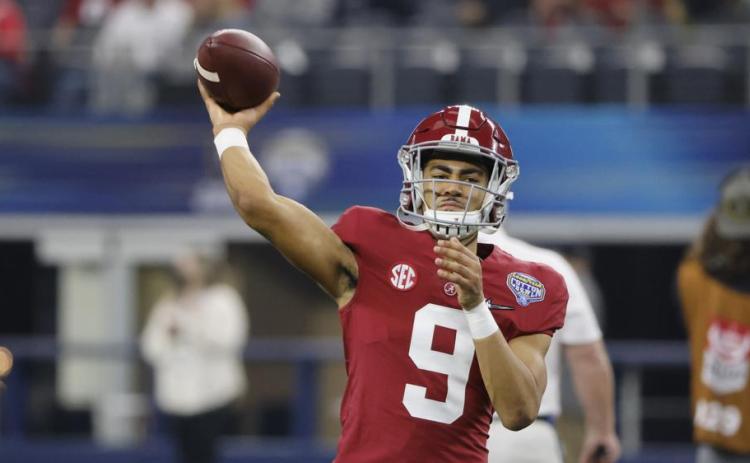 Alabama quarterback Bryce Young throws a pass against Cincinnati during the Cotton Bowl College Football Playoff semifinal on Dec. 31, 2021, in Arlington, Texas. (MICHAEL AINSWORTH/Associated Press))