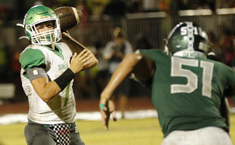 Suwannee quarterback Bronsen Tillotson sets to throw a pass against Flagler Palm Coast on Friday night. (JAMIE WACHTER/Lake City Reporter)