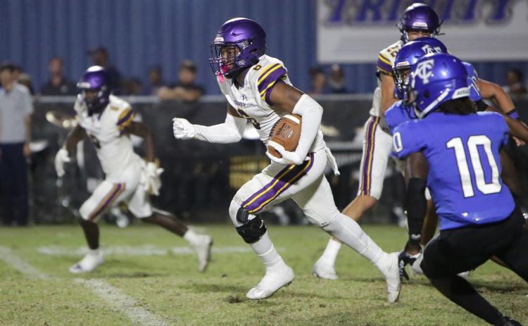 Columbia receiver Tray Tolliver returns a kickoff against Trinity Christian on Friday. (BRENT KUYKENDALL/Lake City Reporter)