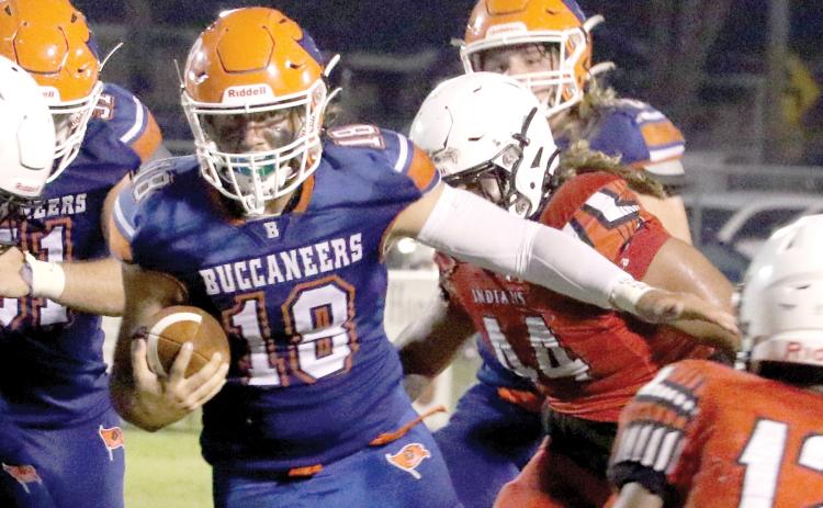 Branford quarterback Cohen David looks for room to run against Fort White in a Preseason Classic game Aug. 19. (MORGAN MCMULLEN/Lake City Reporter)