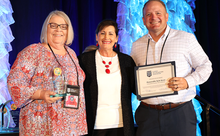 The Columbia County Tax Collector’s office was honored with a 2022 legacy finance award by the Florida Tax Collector’s Association. The award is earned for outstanding finance operations and clean annual audit reports. La Gina Dow, (left) Columbia County Tax Collector Finance Director, and Columbia County Tax Collector Kyle Keen (right) accepted the honors from Florida Tax Collector’s Association President Rhonda Skipper during a recent state event. (COURTESY)