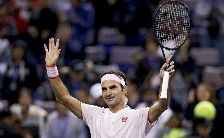 Roger Federer waves to spectators after defeating Daniil Medvedev in their men's singles match of the Shanghai Masters tennis tournament at Qizhong Forest Sports City Tennis Center on Oct. 10, 2018, in Shanghai, China. (AP FILE)