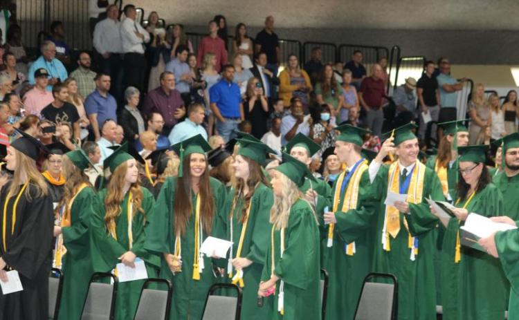 A group of Florida Gateway College graduates celebrate during the college’s graduation ceremony on May 6. (FILE)