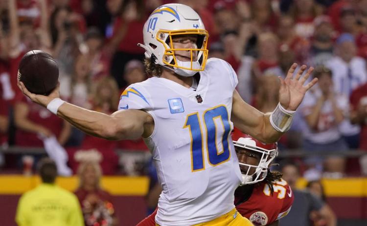 Los Angeles Chargers quarterback Justin Herbert throws against the Kansas City Chiefs on Sept. 15 in Kansas City, Mo. (ED ZURGA/Associated Press)