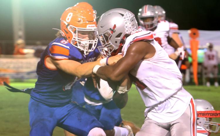 Branford linebacker Trevor Maddox goes in for a tackle against Williston last Friday. (PAUL BUCHANAN/Special to the Reporter)