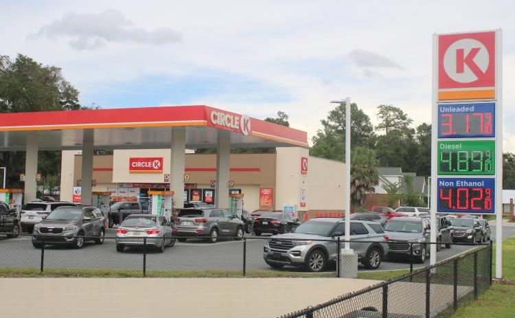 A line of cars wait to fill up at the Circle K gas station at the  intersection of U.S. Highway 90 and Baya Drive Thursday. (TONY BRITT/Lake City Reporter)