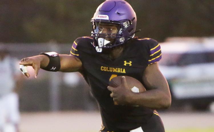 Columbia quarterback Tyler Jefferson scrambles up the field against Madison County last Friday. (BRENT KUYKENDALL/Lake City Reporter)