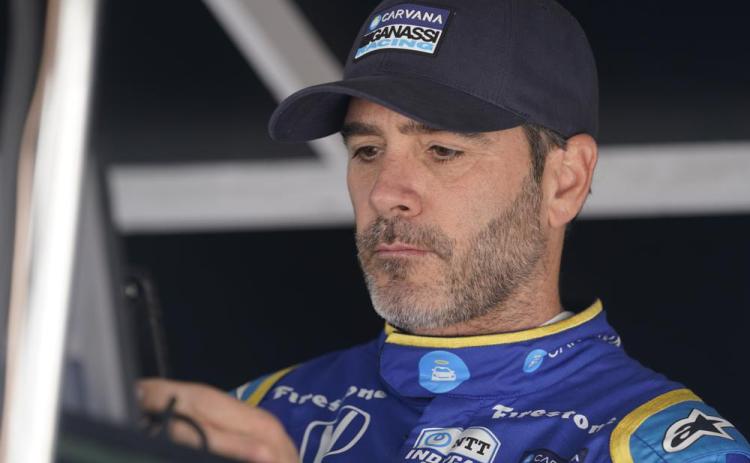 Jimmie Johnson sits in his pit box before the final practice for the Indianapolis 500 at Indianapolis Motor Speedway on May 27 in Indianapolis. (AP FILE)