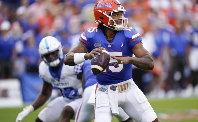 Florida quarterback Anthony Richardson throws a pass against Kentucky on Saturday in Gainesville. (JOHN RAOUX/Associated Press)