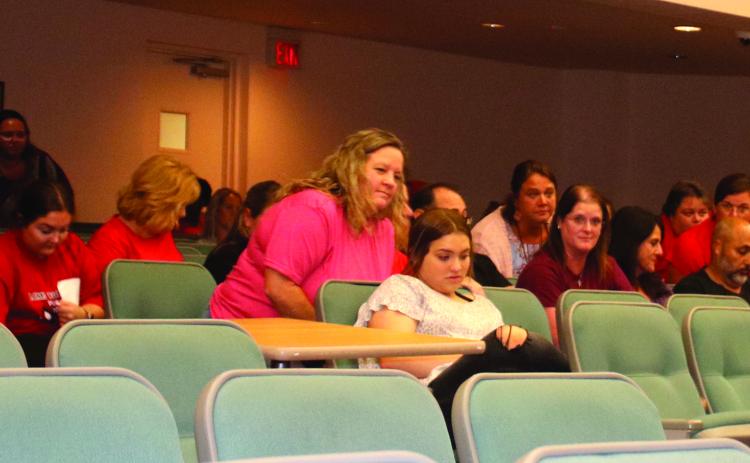 A number of veteran teachers in the Columbia County School District, and supporters, voiced their displeasure with pay at the Columbia County School Board meeting Tuesday night. (TONY BRITT/Lake City Reporter)