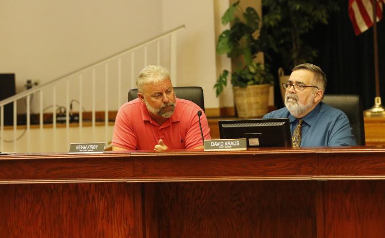 Columbia County Manager David Kraus (right) and Assistant Manager Kevin Kirby detailed the heated meeting with Sylvester Warren during Tuesday’s county commission meeting. (JAMIE WACHTER/Lake City Reporter)