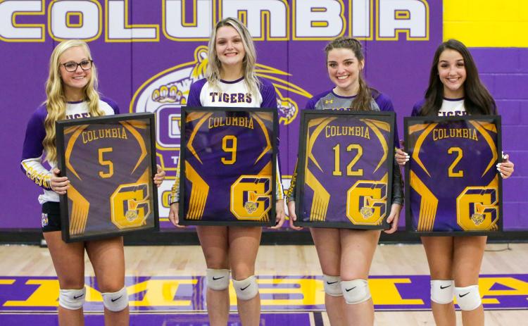 Columbia seniors Bailey Campbell (from left), Madison Glenn, Savannah Bailey and Jaslin Maytin were honored on Senior Night prior to Monday’s match against Fort White . (BRENT KUYKENDALL/Lake City Reporter)