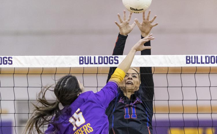 Branford’s Jadyn Mosley tries to block a shot by Union County’s Jaycee Davis during Thursday’s District 6-1A championship on Thursday. (JACK HOWDESHELL/Special to the Reporter)