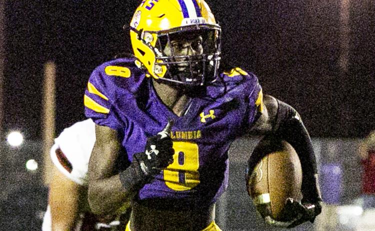 Columbia receiver Jaylen Cooper runs up the field after a catch against Middleburg last Friday night. (JEN CHASTEEN/Special to the Reporter)