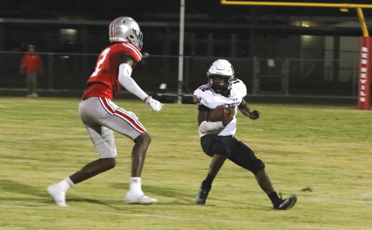 Fort White running back Najeeb Smith makes a move in the open field against Williston on Sept. 23. (MORGAN MCMULLEN/Lake City Reporter)