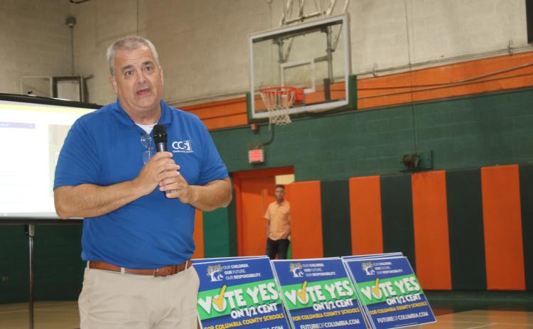 Superintendent Lex Carswell speaks at Richardson Community Center Thursday on the proposed half-cent sales tax to fund new schools. (TONY BRITT/Lake City Reporter)