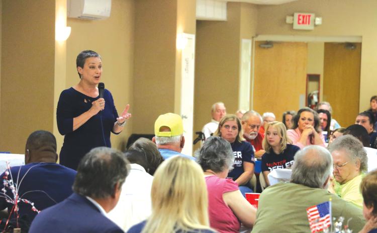 School board candidate Elizabeth Porter speaks during a GOP rally at the Florida Gateway Fairgrounds in July. (FILE)